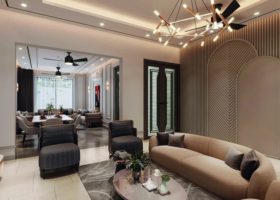 A living room with a fluted feature wall, curved sofa and statement ceiling light